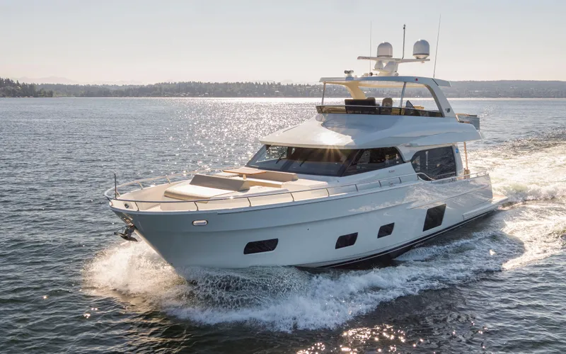 The Image of Luxury 2017 Ocean Alexander 70 E yacht cruising on open water. - 0