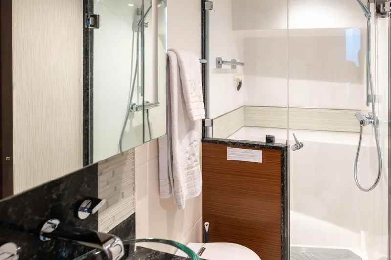 Slide: The Image of Luxurious bathroom in 2017 Ocean Alexander 70 E yacht with modern shower and elegant fixtures. - 27