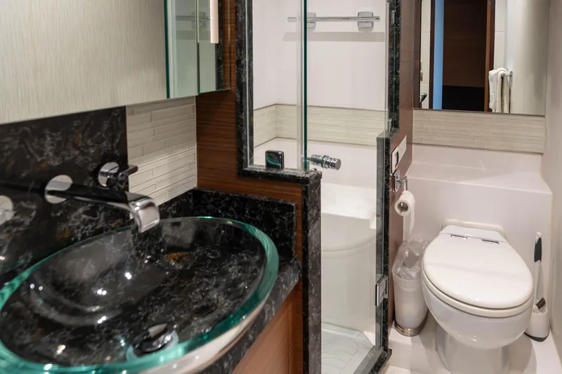 Slide: The Image of Luxurious bathroom in 2017 Ocean Alexander 70 E yacht with modern fixtures and elegant design. - 32