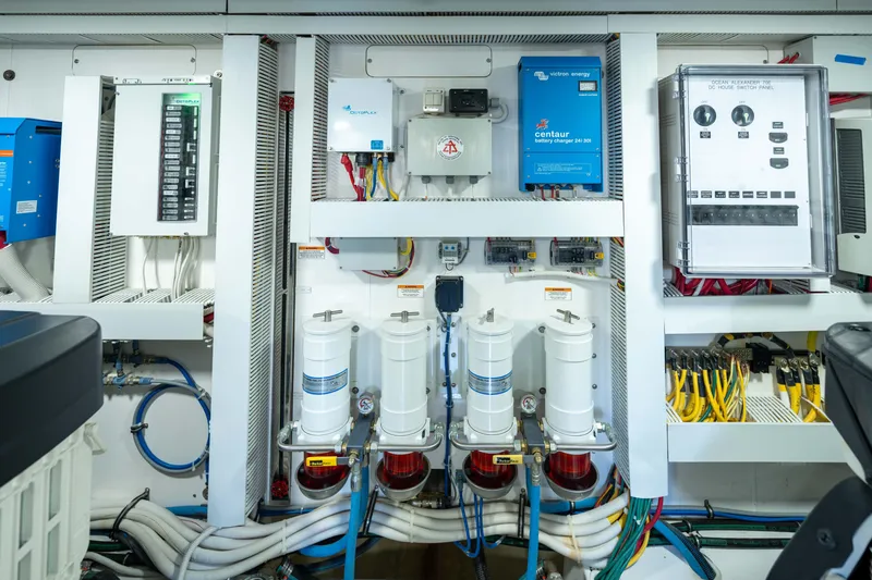 Slide: The Image of Engine room of 2017 Ocean Alexander 70 E yacht with electrical panels and equipment. - 54