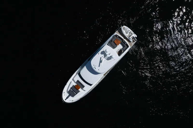 Slide: The Image of Aerial view of 2017 Ocean Alexander 70 E yacht on dark water. - 58