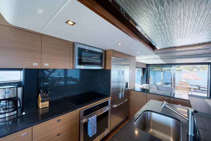 Slide: The Image of Luxurious interior of 2017 Ocean Alexander 70 E yacht with waterfront view. - 15
