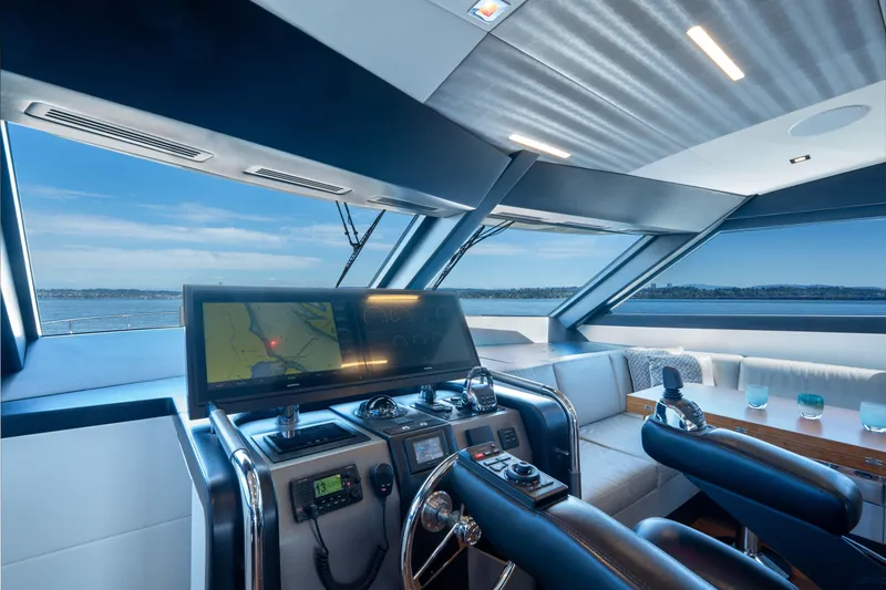 Slide: The Image of Luxurious helm of 2017 Ocean Alexander 70 E yacht with modern navigation equipment. - 20