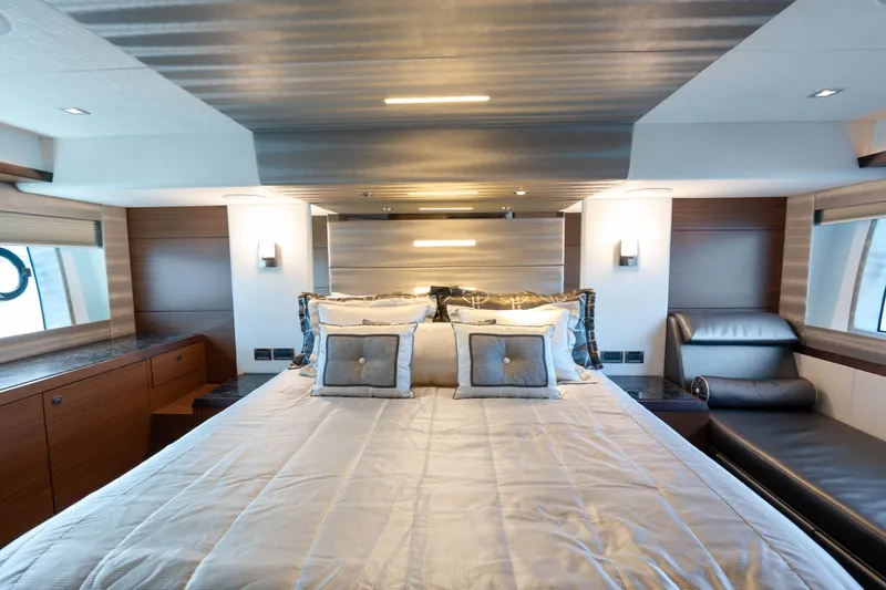 Slide: The Image of Luxurious bedroom interior of 2017 Ocean Alexander 70 E yacht, featuring elegant decor and lighting. - 23