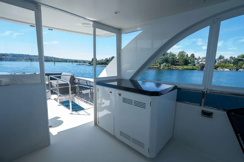 Slide: The Image of Luxurious interior of 2017 Ocean Alexander 70 E yacht with scenic water view. - 41