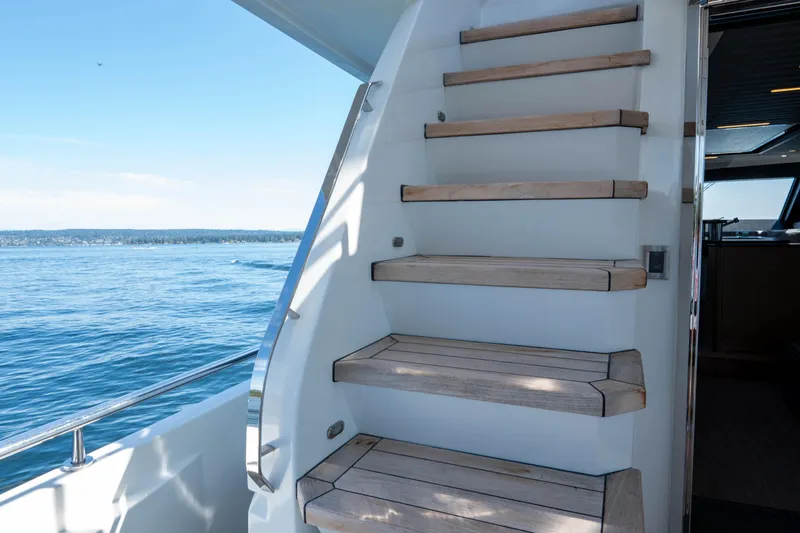 Slide: The Image of Luxurious seating area on 2017 Ocean Alexander 70 E yacht with scenic ocean view. - 45