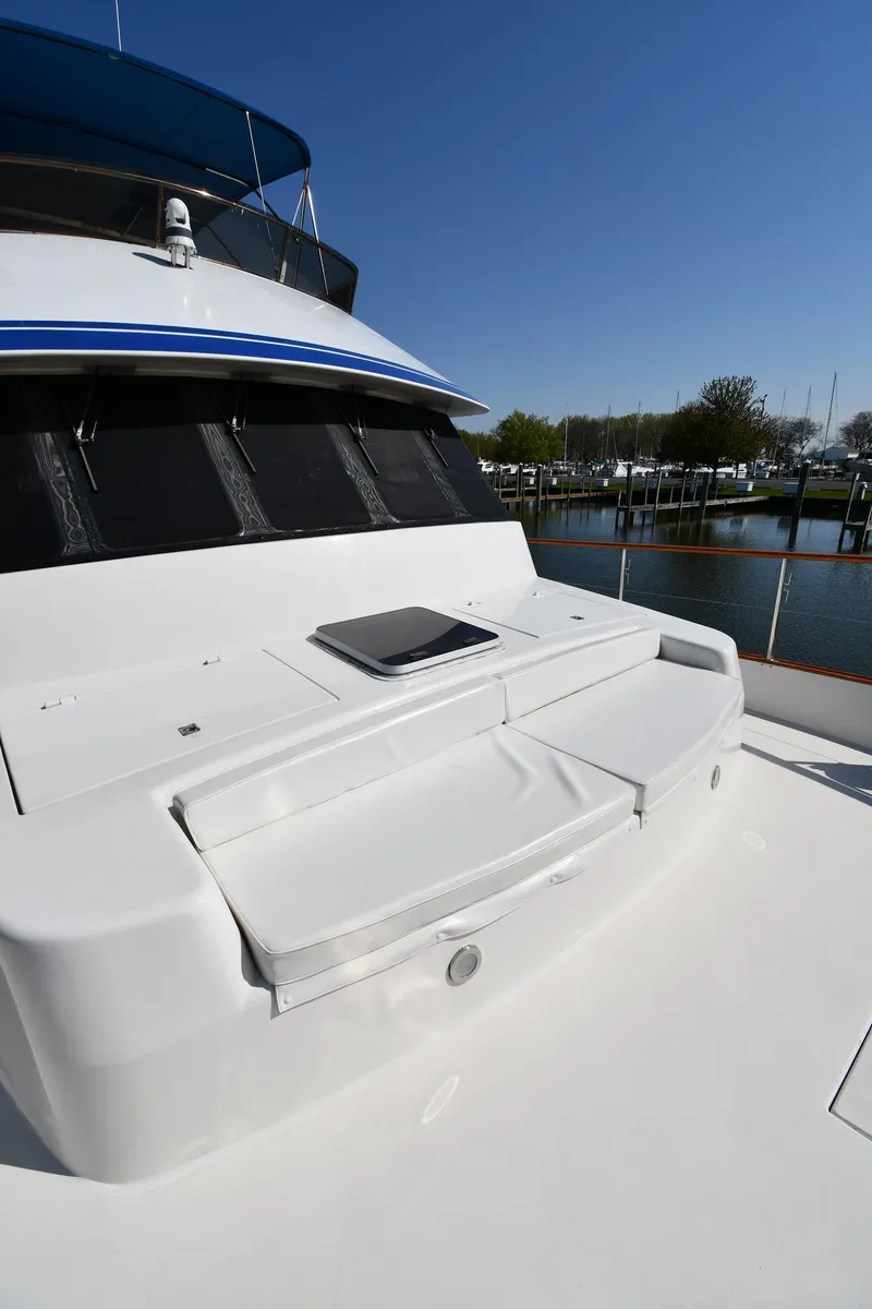 Slide: The Image of 1986 Lowland 64 Pilot House Long Range Motor Yacht deck with seating area. - 15