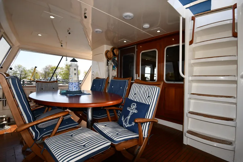 Slide: The Image of Interior of 1986 Lowland 64 Pilot House Long Range Motor Yacht with dining area. - 19