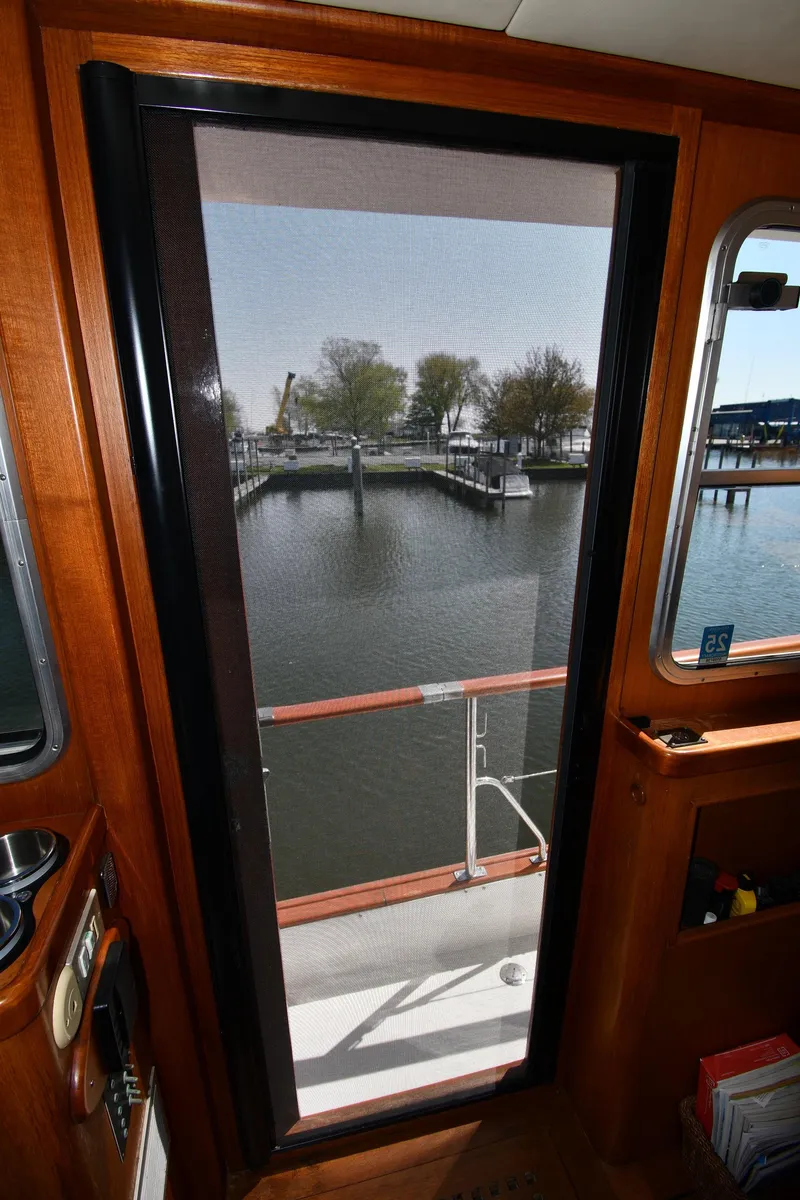 Slide: The Image of Lowland 64 Pilot House Long Range Motor Yacht 1986 - 91