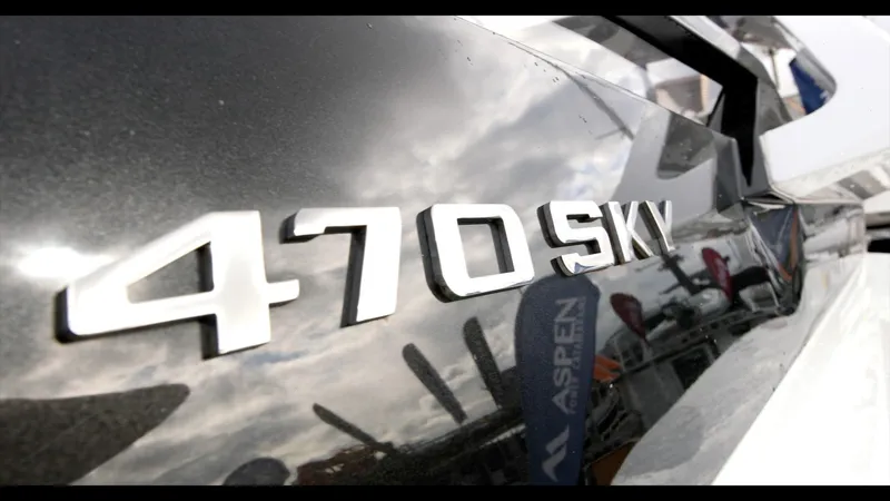 Slide: The Image of Close-up of 2024 Galeon 470 Sky yacht model name on the hull. - 14