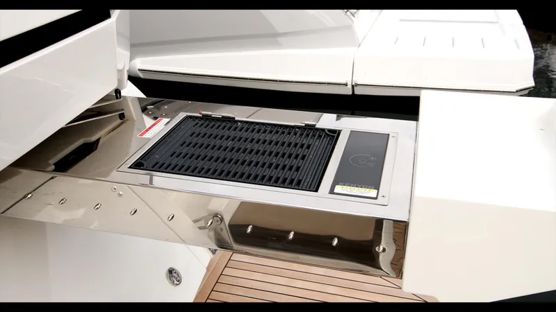 Slide: The Image of Galeon 470 Sky 2024 yacht with built-in outdoor grill on deck. - 17