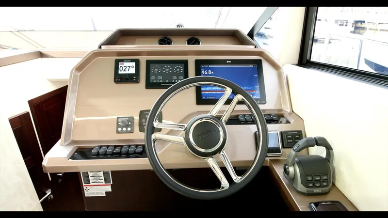 Slide: The Image of Helm station of 2024 Galeon 470 Sky yacht with modern navigation equipment. - 23