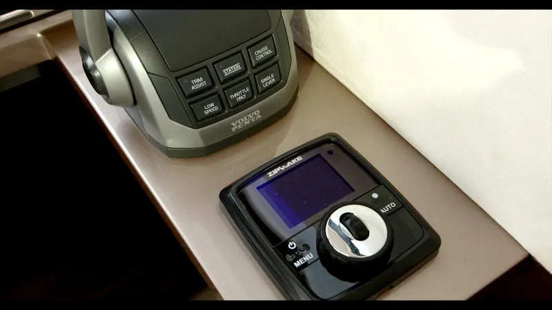 Slide: The Image of Control panel of 2024 Galeon 470 Sky yacht with joystick and display. - 24