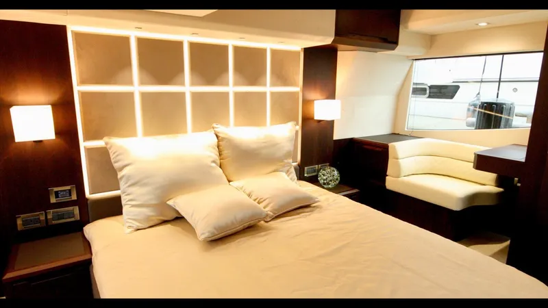 Slide: The Image of Luxurious bedroom interior of 2024 Galeon 470 Sky yacht with modern lighting and cozy seating. - 29