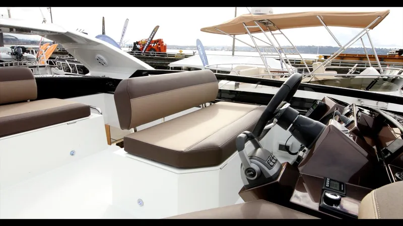 Slide: The Image of 2024 Galeon 470 Sky yacht interior with modern helm and seating. - 35