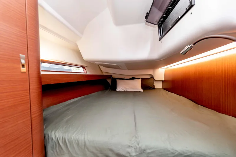 Slide: The Image of Couple enjoying breakfast on a 2026 Dehler 46 yacht, with scenic ocean view. - 38