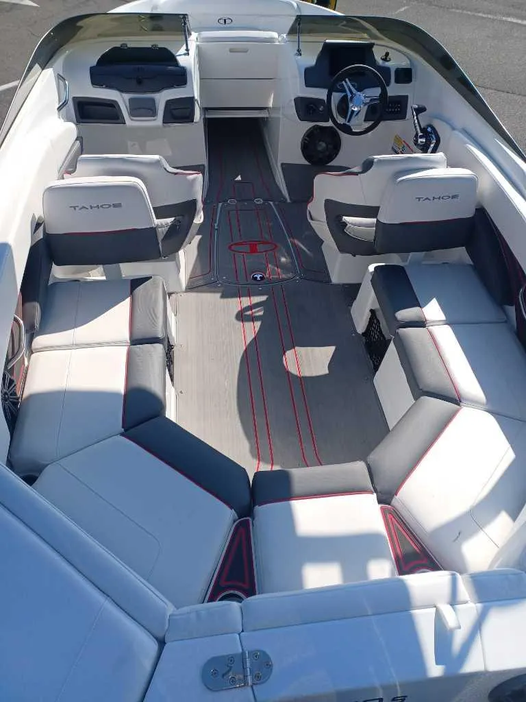 Slide: The Image of 2024 Tahoe 210 S Limited boat interior with spacious seating and modern design. - 2
