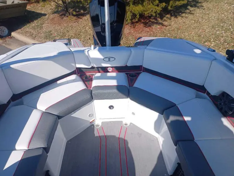 Slide: The Image of 2024 Tahoe 210 S Limited boat interior with cushioned seating. - 5