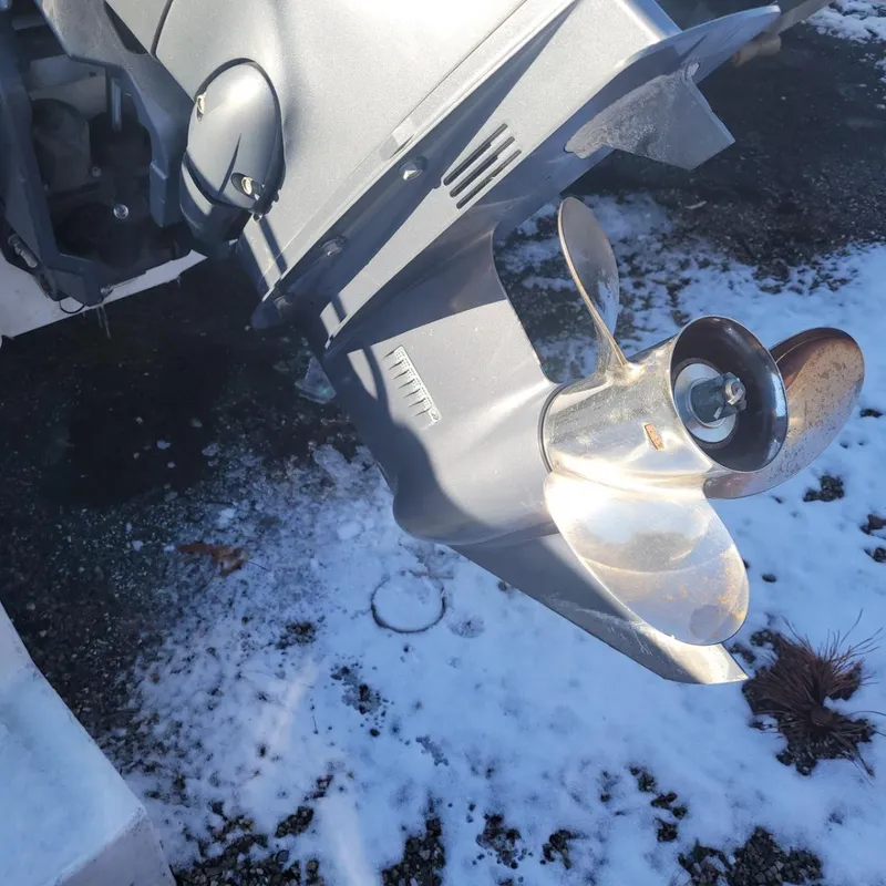Slide: The Image of Close-up of a 2013 Sea Hunt 182 Center Console boat propeller in snowy conditions. - 4
