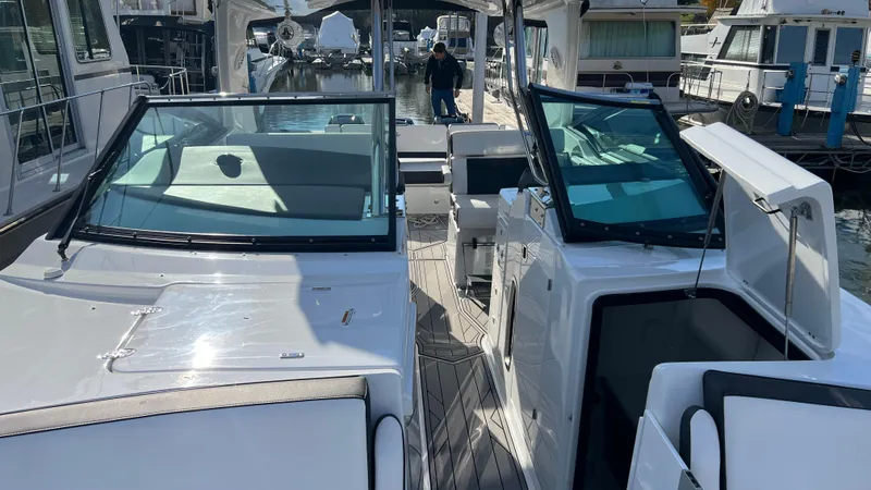 Slide: The Image of 2021 Monterey 385 SE yacht interior with sleek design and spacious seating. - 10