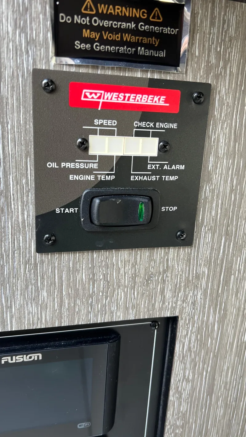 Slide: The Image of Westerbeke generator control panel on a 2021 Monterey 385 SE boat. - 30