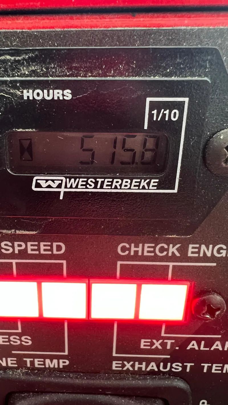 Slide: The Image of Westerbeke engine hour meter displaying 515.6 hours on a 2021 Monterey 385 SE. - 36
