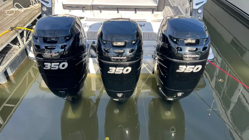 Slide: The Image of 2021 Monterey 385 SE with triple Mercury Verado 350 outboard engines. - 6