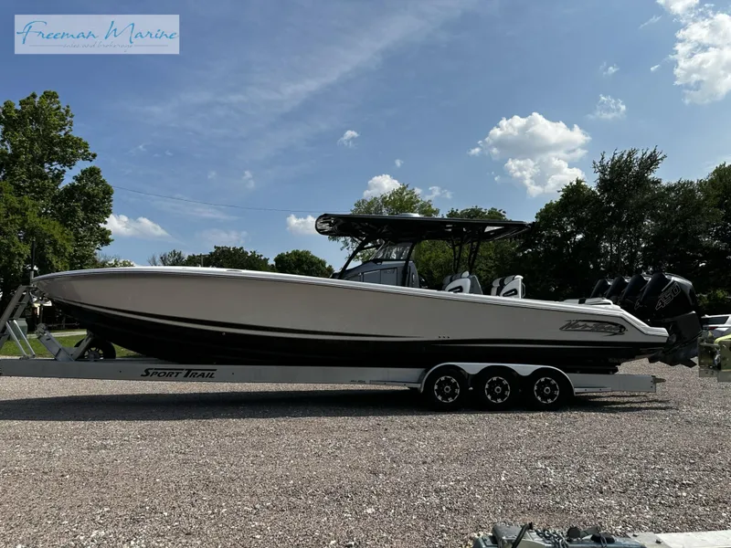 Slide: The Image of 2022 Nor-Tech 390 Center Console boat on a Sport Trail trailer. - 13