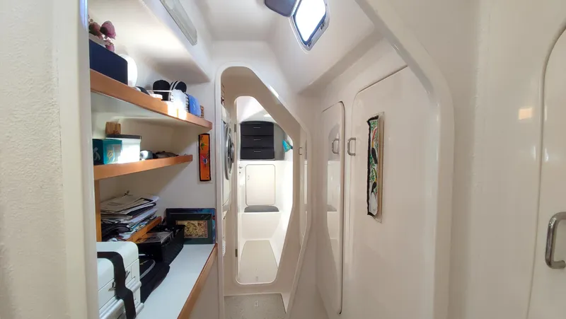 Slide: The Image of Interior of 2002 Voyage 440 yacht with shelves and storage space. - 21