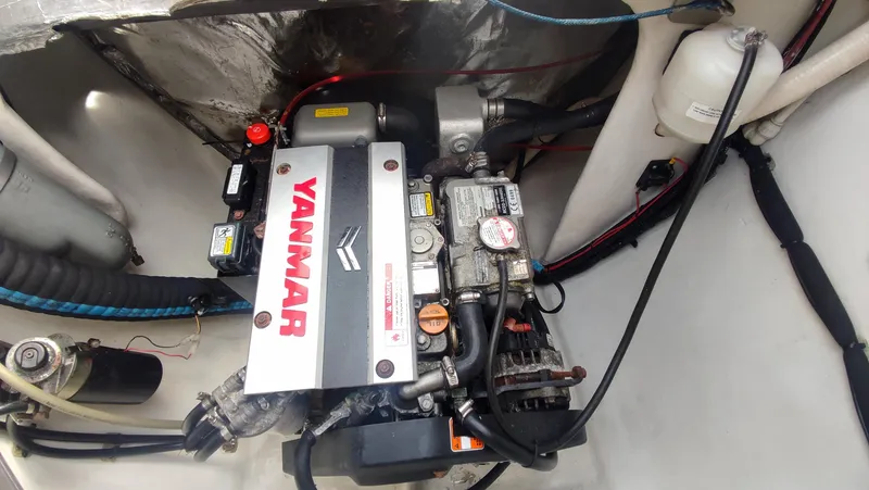 Slide: The Image of Yanmar engine in a 2002 Voyage 440 sailboat, detailed view. - 28