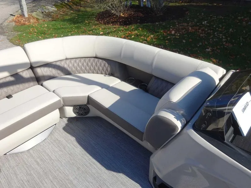 Slide: The Image of 2024 Harris Sunliner 230 Sport interior with plush seating and modern design. - 16