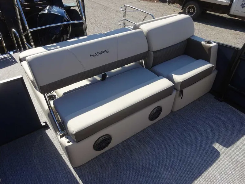 Slide: The Image of 2024 Harris Sunliner 230 Sport boat seating with integrated speakers. - 6