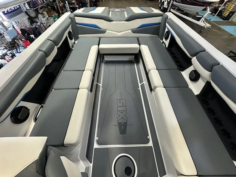 Slide: The Image of 2024 Axis T250 boat interior with spacious seating and modern design. - 18