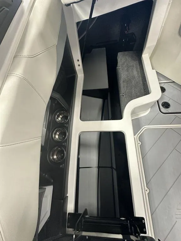 Slide: The Image of 2024 Malibu 23 LSV interior seating and storage area. - 12