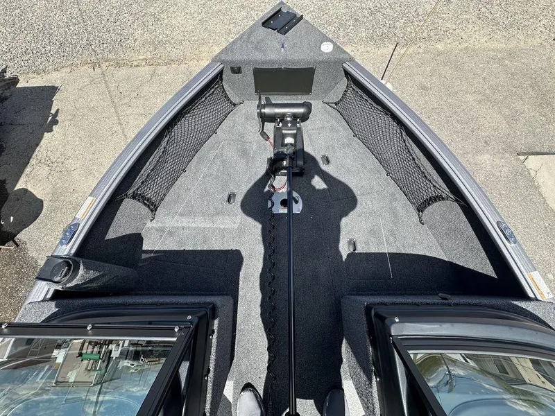 Slide: The Image of 2024 Lund 1875 Impact XS Sport boat interior, front deck view. - 7