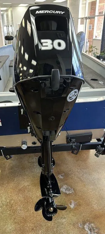 Slide: The Image of 2024 Lund 1400 Fury Tiller with Mercury 30 HP outboard motor. - 5