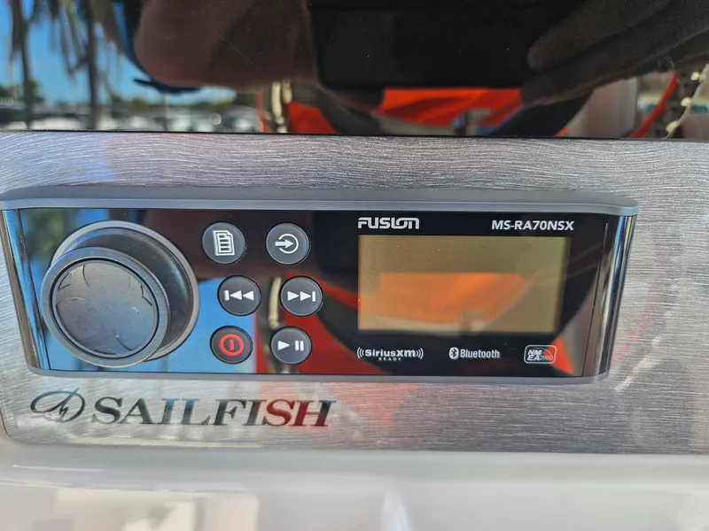 Slide: The Image of 2024 Sailfish 312CC boat with Fusion MS-RA70NSX stereo system. - 25