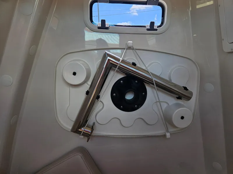 Slide: The Image of 2024 Sailfish 312CC interior detail with mounted equipment and window. - 34