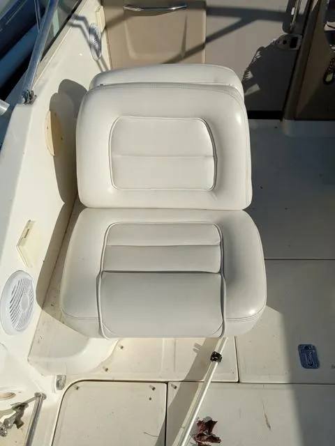 Slide: The Image of White leather seats on a 2001 Sea Ray 290 Amberjack boat. - 4