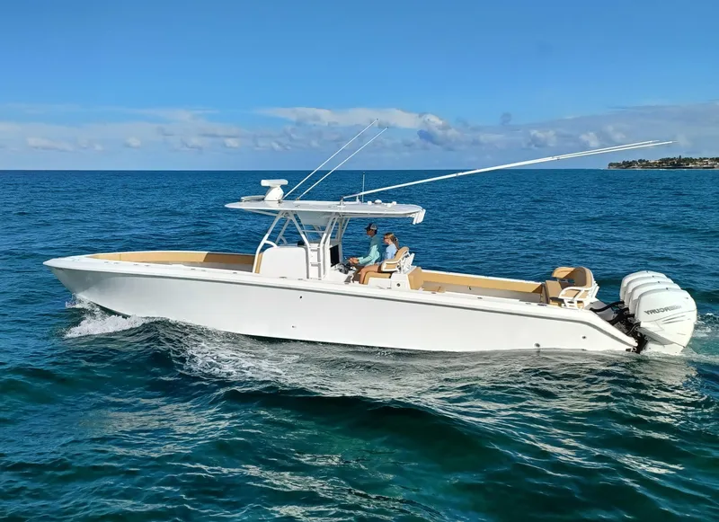 Slide: The Image of 2020 Bahama 41 Open Fisherman boat cruising on the ocean. - 1