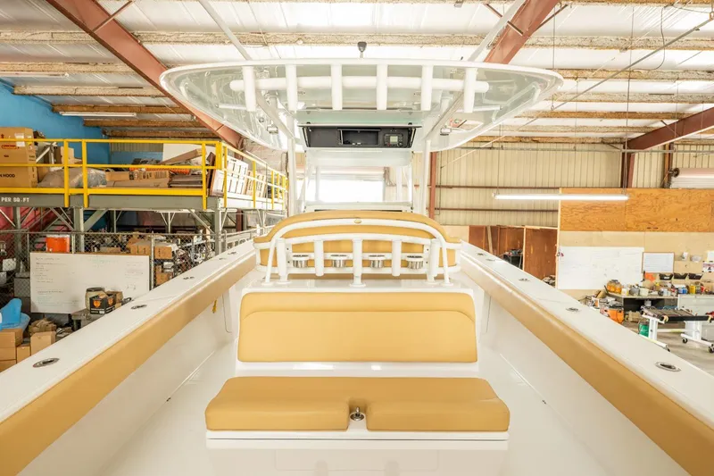 Slide: The Image of 2020 Bahama 41 Open Fisherman boat interior in a warehouse. - 9