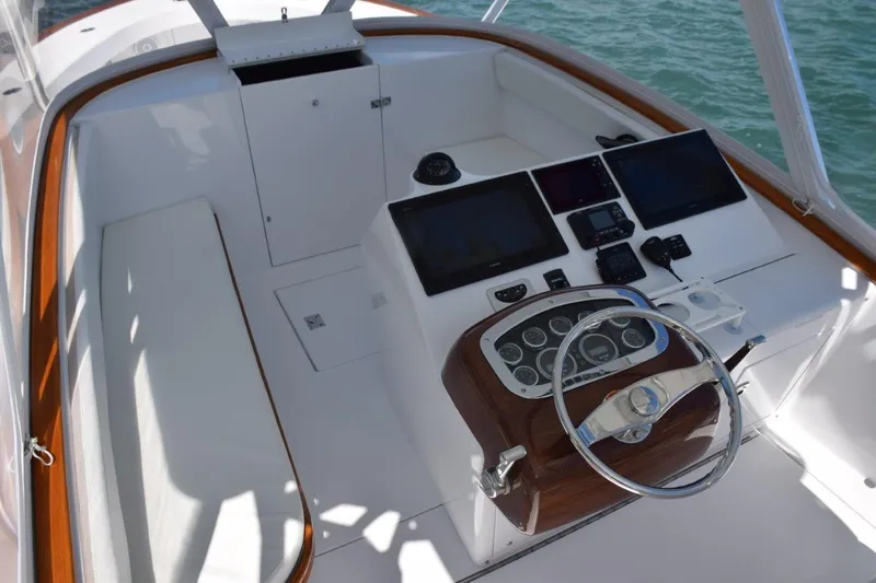 Slide: The Image of Bridgedeck with teak cap railing and seat trim - 14