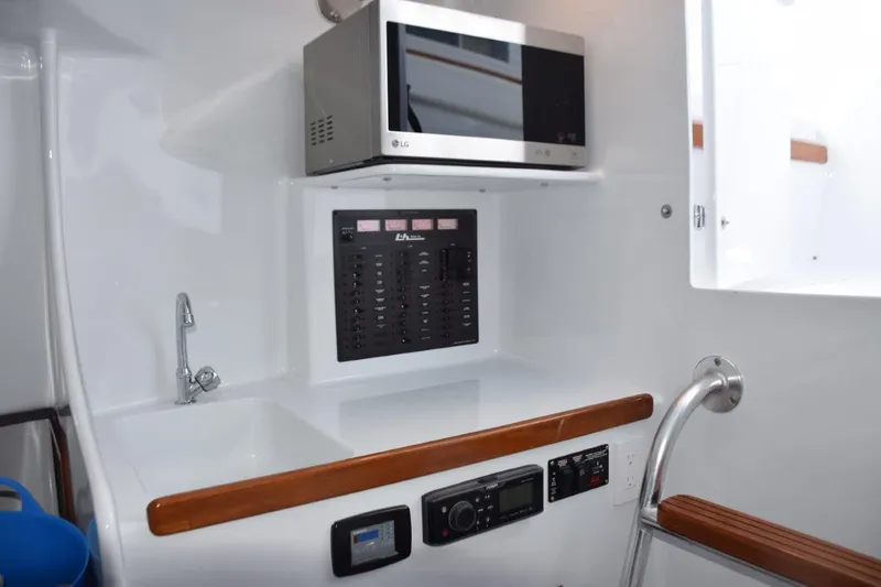 Slide: The Image of Microwave, sink and countertop - 17