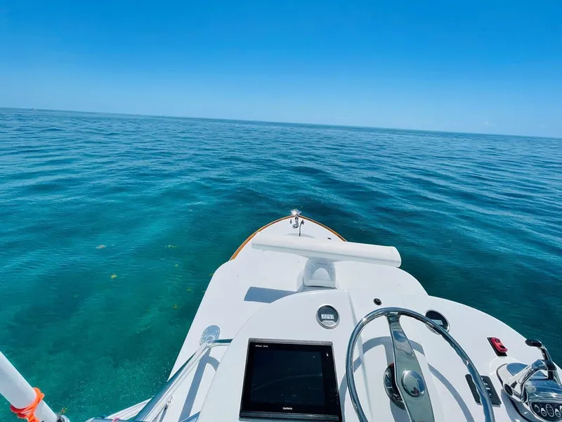 Slide: The Image of 2024 L&H Walk-Around Sportfish boat on clear blue ocean. - 38