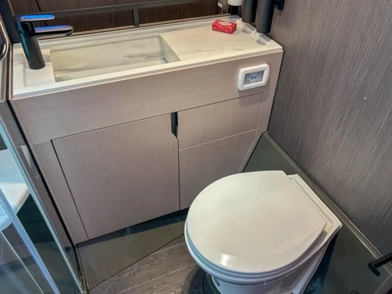 Slide: The Image of Modern bathroom in 2024 Windy 40 Camira SX yacht with sleek sink and toilet. - 15
