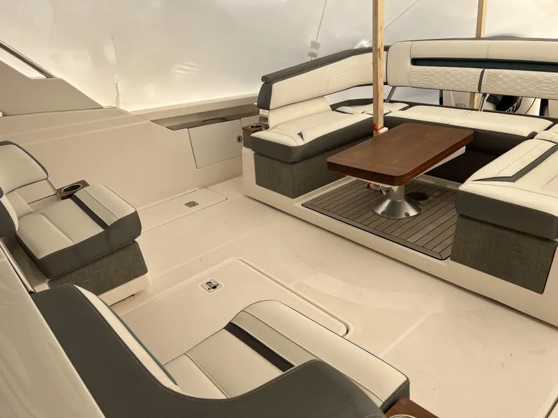 Slide: The Image of Luxurious interior of a 2019 Tiara Sport 38 yacht with elegant seating and table. - 24