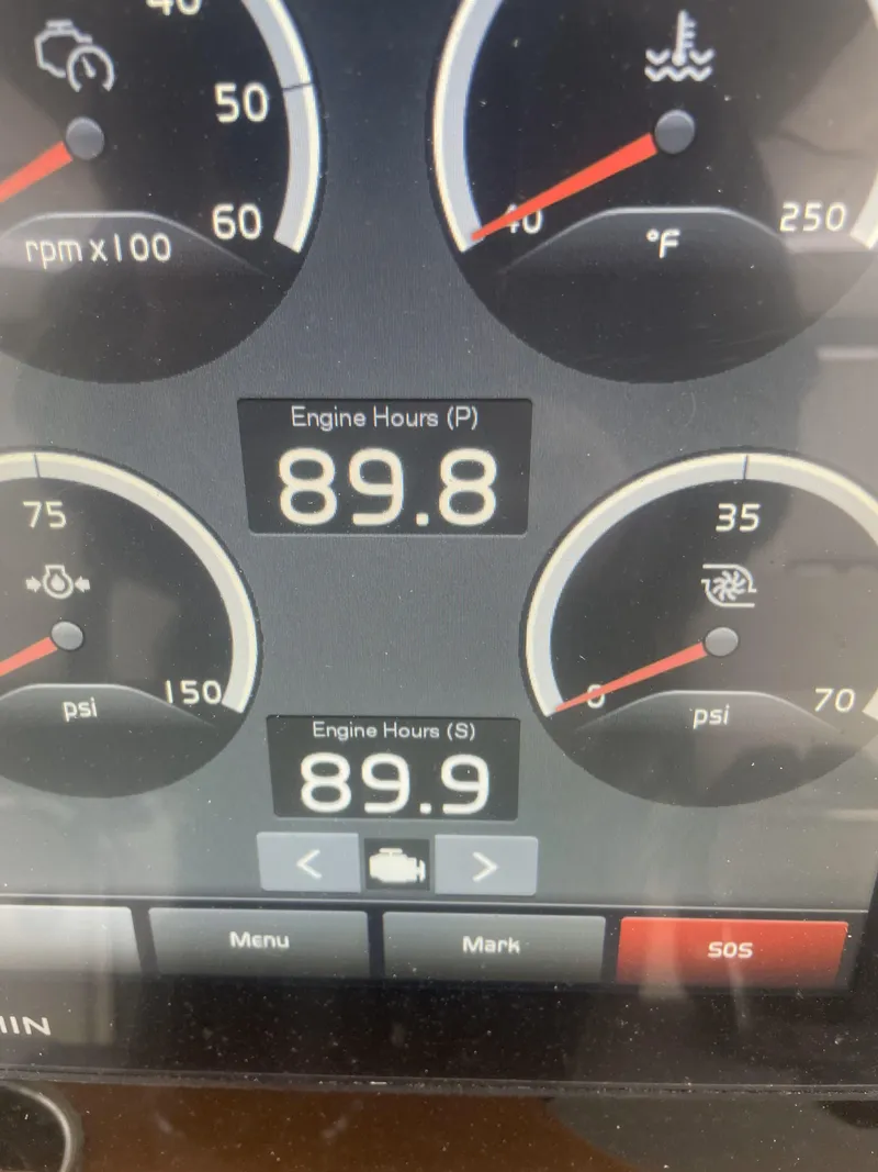 Slide: The Image of 2019 Tiara Sport 38 engine hours display showing 89.8 and 89.9 hours. - 4
