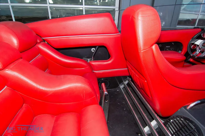 Slide: The Image of Interior of a 2009 Donzi 38 ZRC with red leather seats. - 20