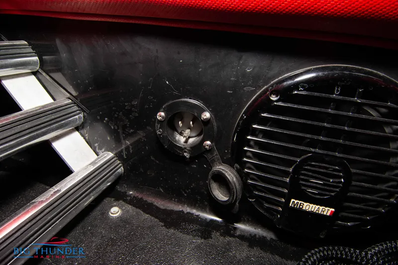 Slide: The Image of 2009 Donzi 38 ZRC interior detail with speaker and ladder. - 24