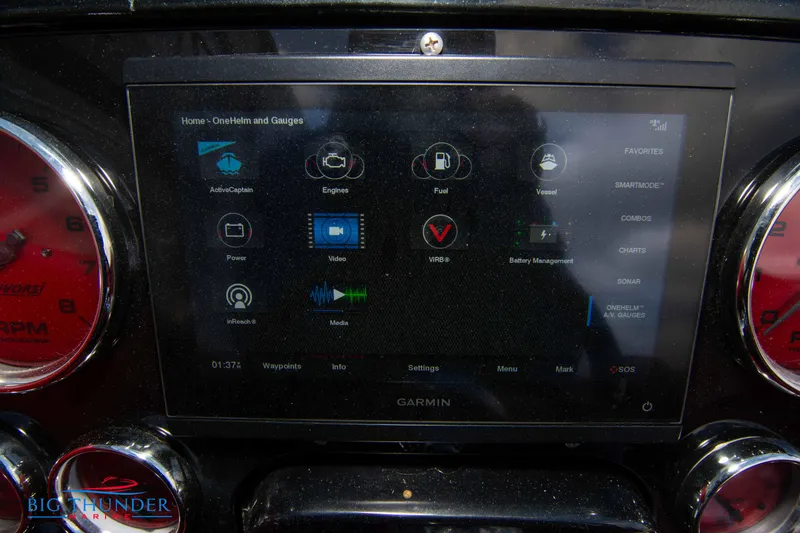 Slide: The Image of Garmin touchscreen display on 2009 Donzi 38 ZRC boat dashboard. - 31